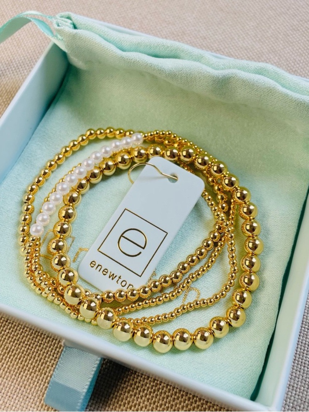 Enewton 4-Piece Gold and Pearl Bracelet Set
